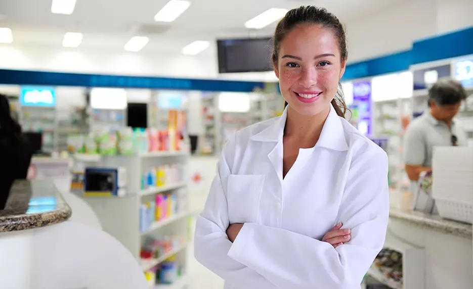 female pharmacy technician smiling