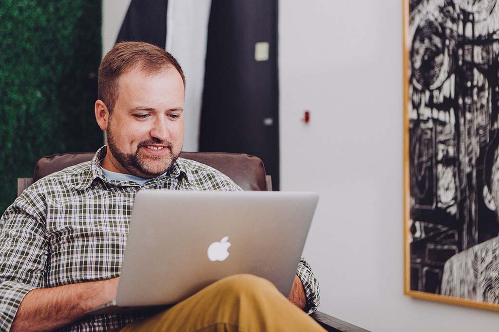 man working on a laptop