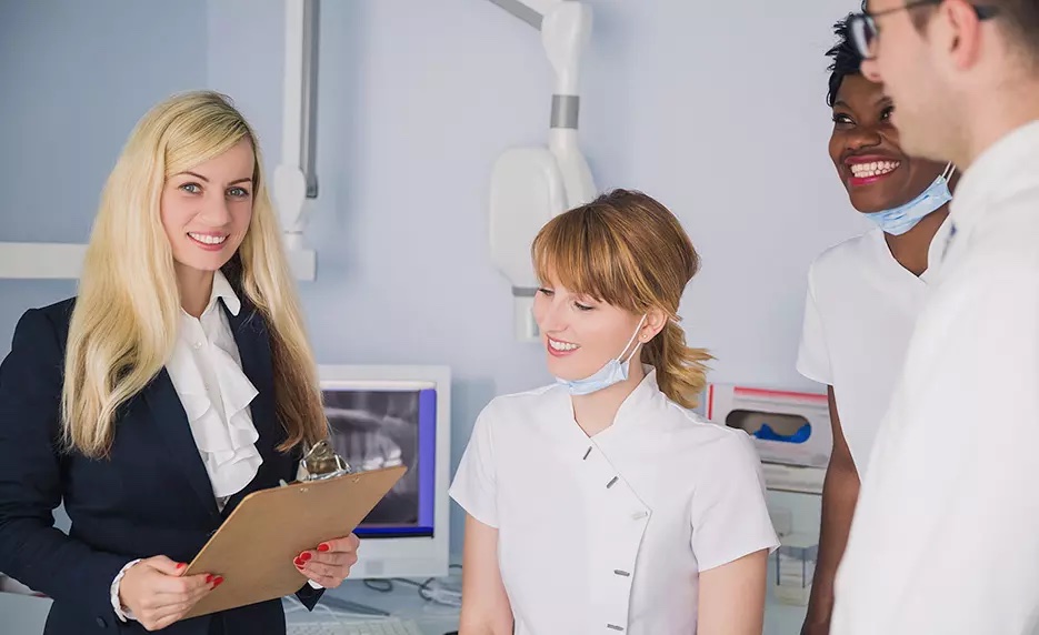 smiling female dentist office manager