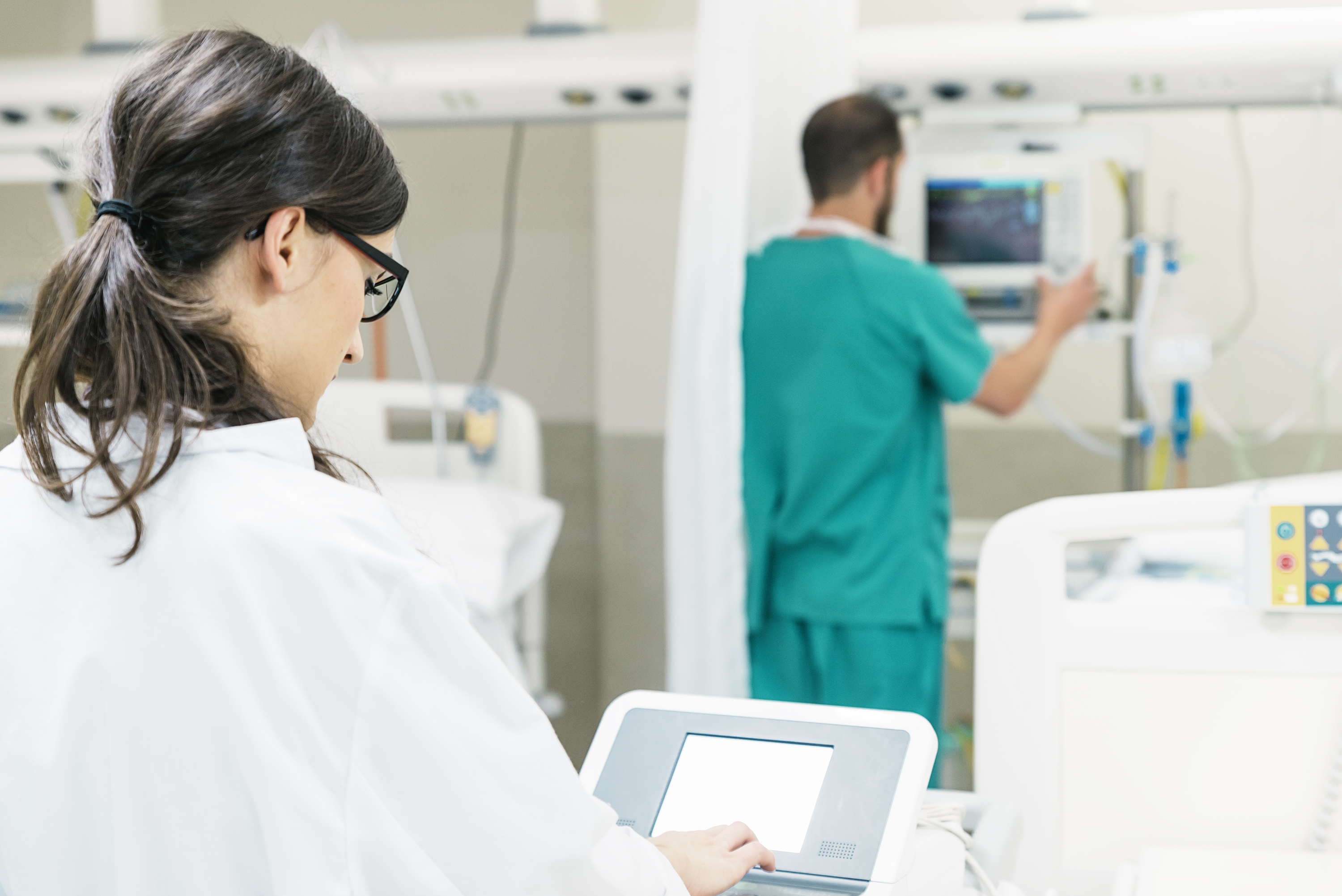 nurse in hospital room