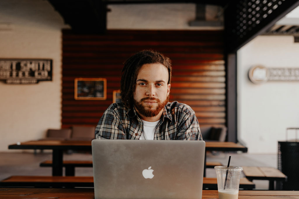 young man with a laptop