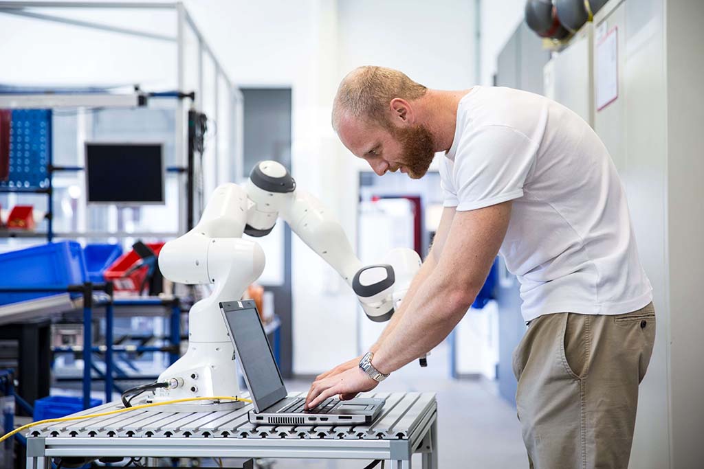 young man working in programmable logic controllers