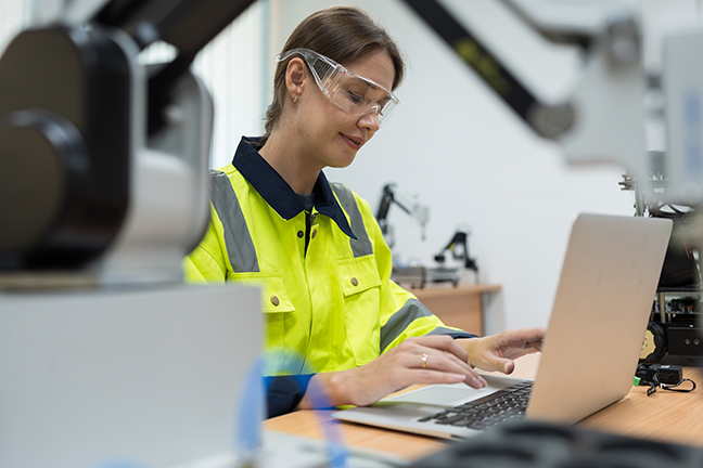 young woman working in programmable logic controllers