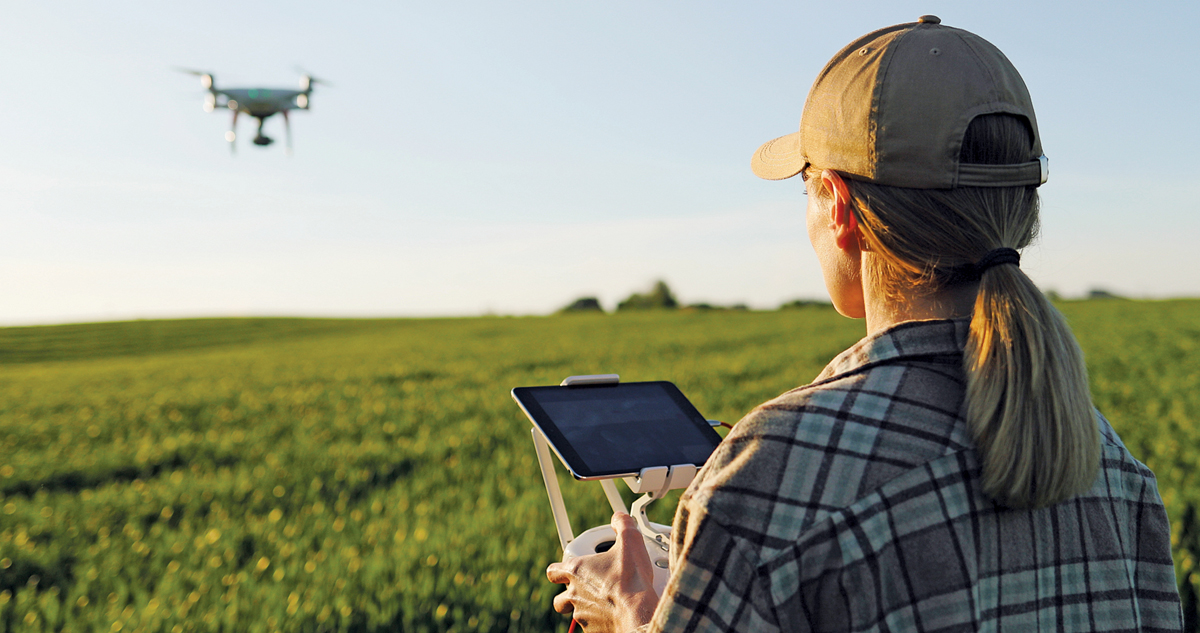 ag student flying a drone