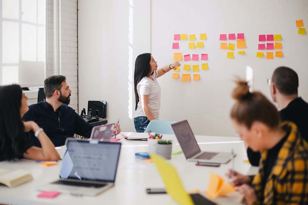 woman leading a team meeting