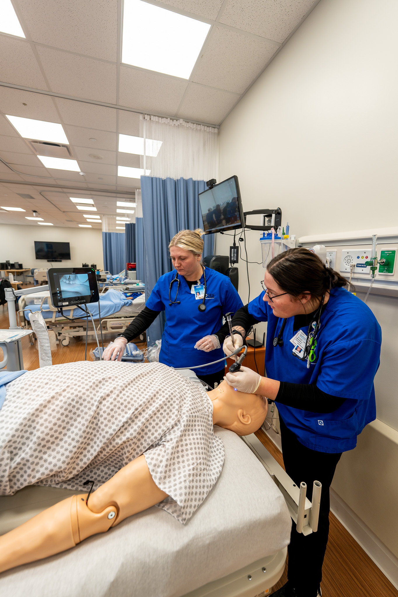 Student Listening to Patients lungs